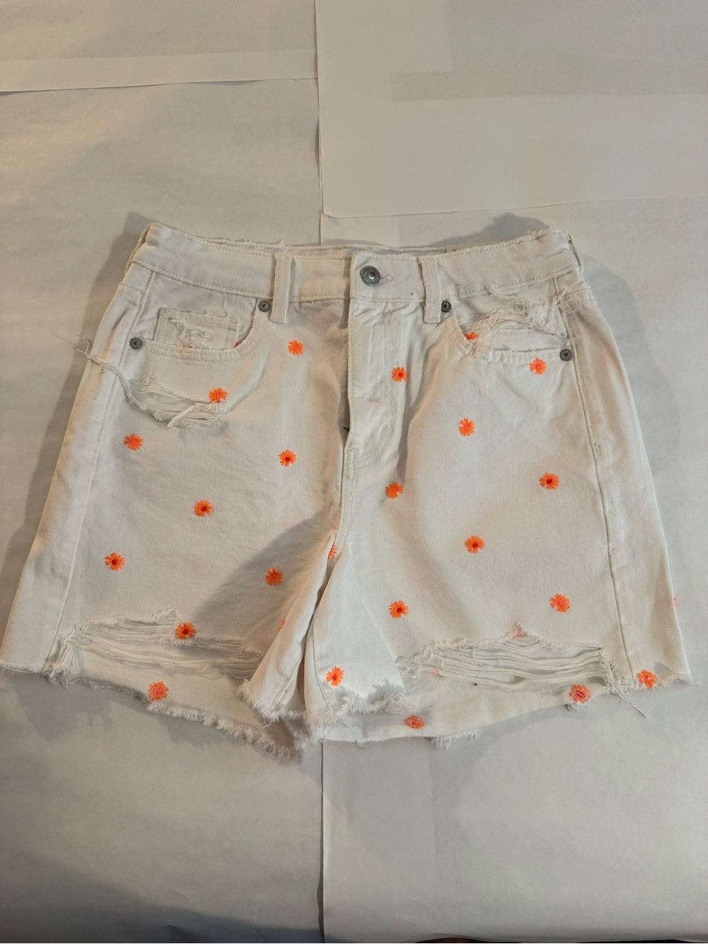 American Eagle Outfitters White Denim Shorts with Orange Daisy Embroidery